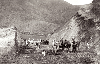 highway building with mules and Fresno scrapers